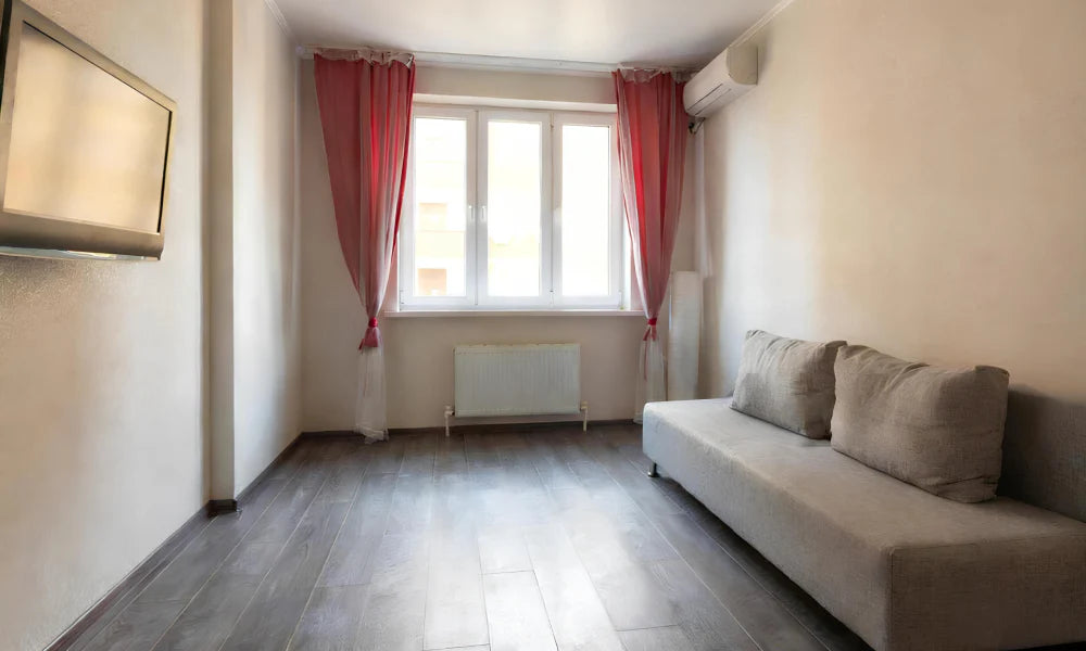 A cozy room with a mini-split system and radiators