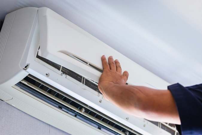 Air Conditioner Not Blowing Cold Air? Why & How to Fix It