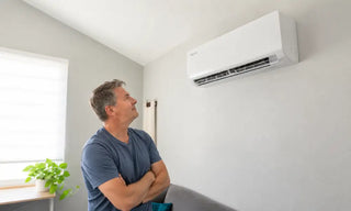 Homeowner checking ductless mini split