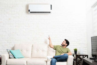 How Many Watts Does a Mini Split Use  Energy-Saving Guide - A man is enjoying his mini splits