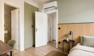 Mini split bedroom with open door