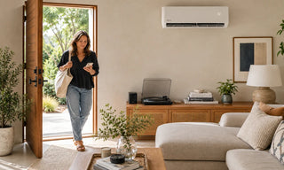 Woman entering home with mini split