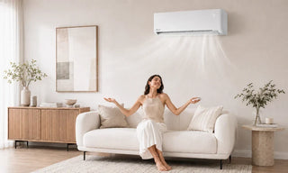Woman relaxing beneath wall-mounted mini split