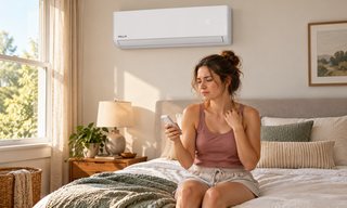Turn on the air conditioner to cool down the room.