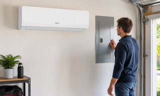 Homeowner checks DELLA mini split AC breaker